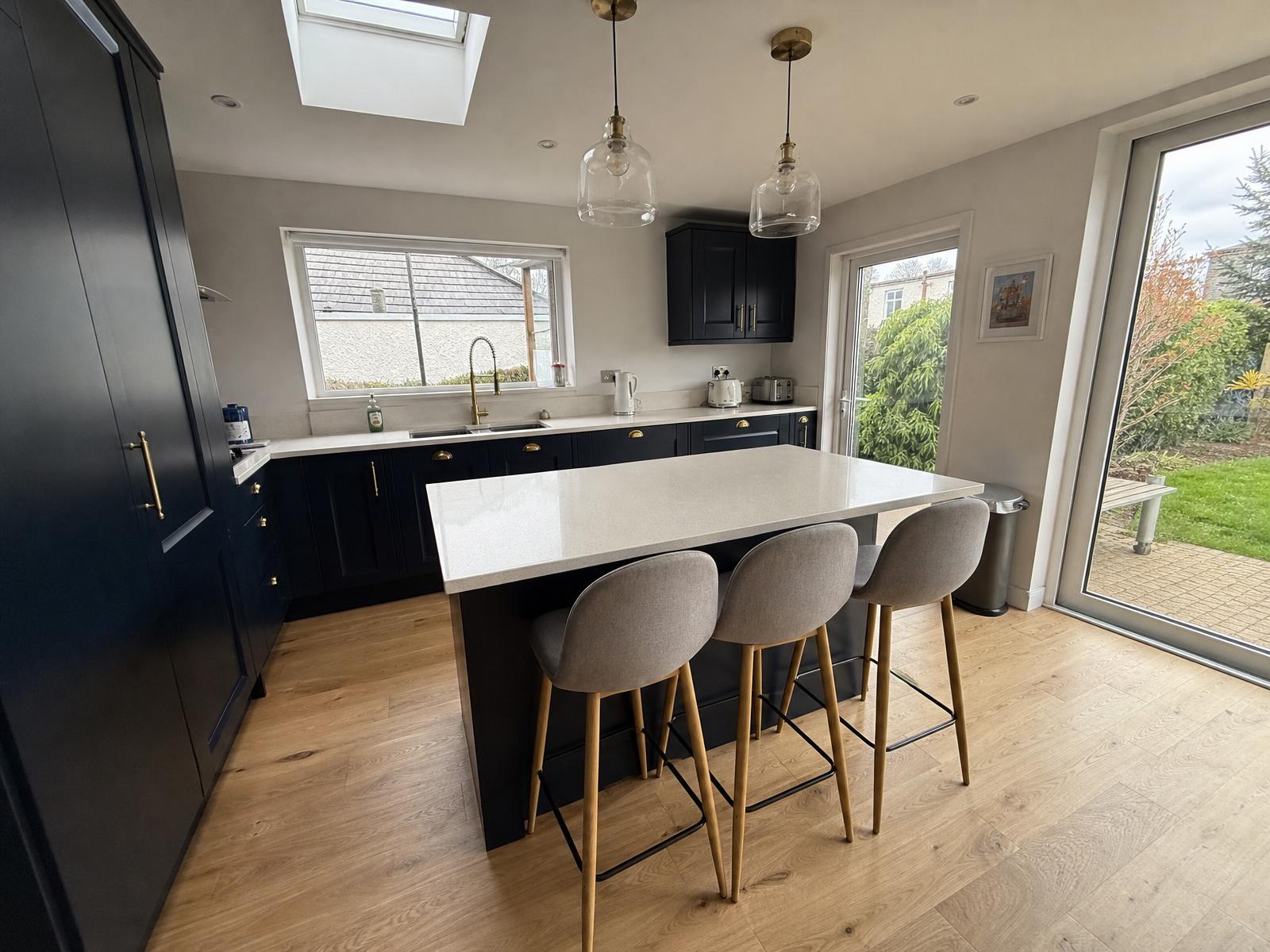 Newly fitted navy kitchen in a renovated Dublin house